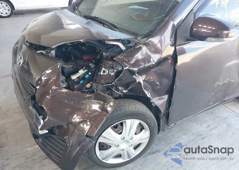2012 Scion Iq from USA, damaged, VIN JTNJJXB00CJ020959